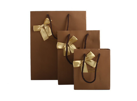 Los bolsos del regalo/el partido de papel promocionales del papel empaqueta con las manijas para el empaquetado del chocolate