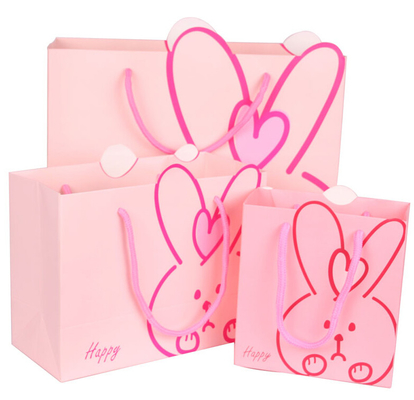 Bolsos de compras de papel de encargo del bolso de papel lindo del regalo del modelo del conejo para la tienda al por menor